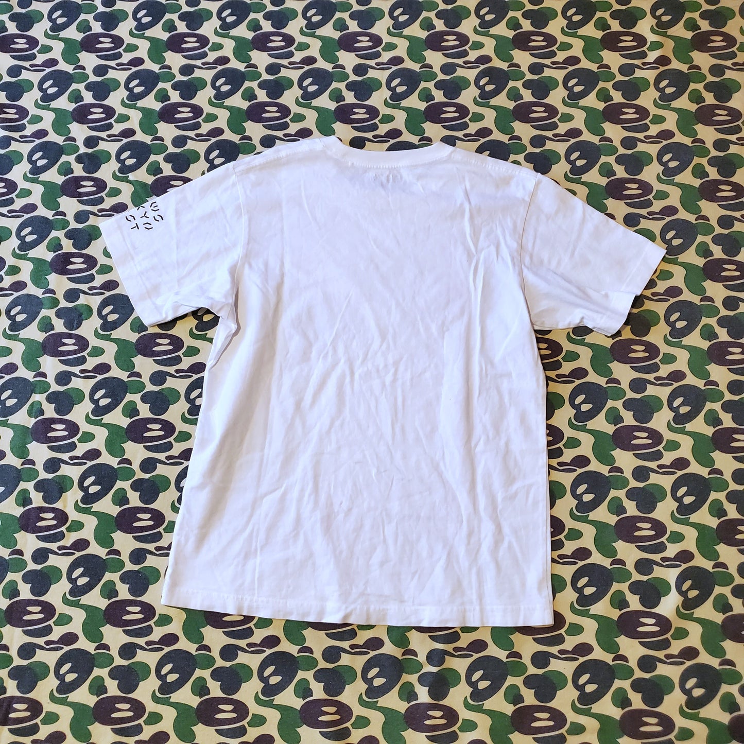 KAWs x Uniqlo UT Figure/Tokyo Graphic Shirt